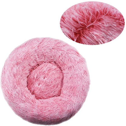 Ultra-soft round plush pet bed for cats and dogs, winter-ready with long plush fabric and non-slip base, available in sizes from 40cm to 90cm.