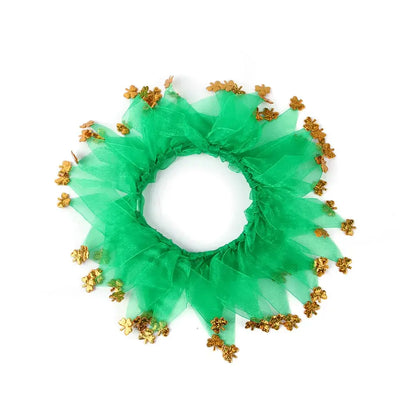 Dog and cat wearing colorful Christmas and Halloween-themed pet collars.