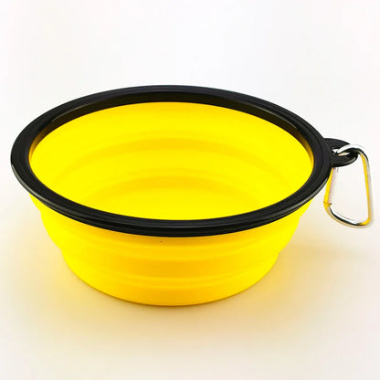 Collapsible silicone dog bowl for travel, camping, and hiking, lightweight and portable for outdoor pet feeding.