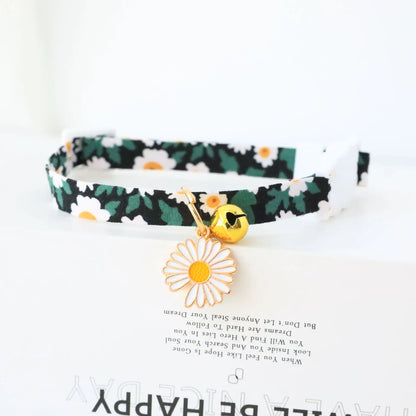 Reflective plaid cat collar with bow and daisy charm for small pets