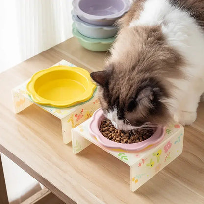 Flower-shaped ceramic pet bowl with clear acrylic stand for cats and dogs.