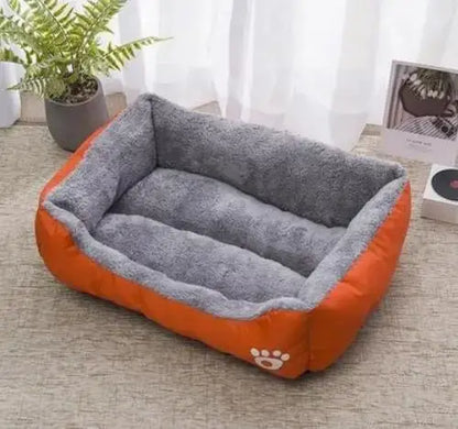 Bone-shaped soft cotton dog bed, washable and breathable with warm padding, designed for year-round comfort and suitable for dogs of all sizes.