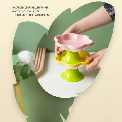 Elevated ceramic cat bowl with elegant flower design for comfortable and healthy feeding.