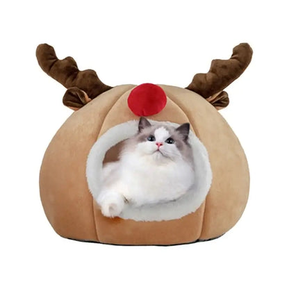 Indoor cat cave bed with Christmas reindeer design for holiday comfort and warmth.