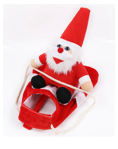 Dog wearing a red Santa Claus costume for Christmas photos and holiday parties