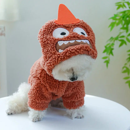 Small dog wearing a thick plush Halloween hoodie coat for chilly weather.