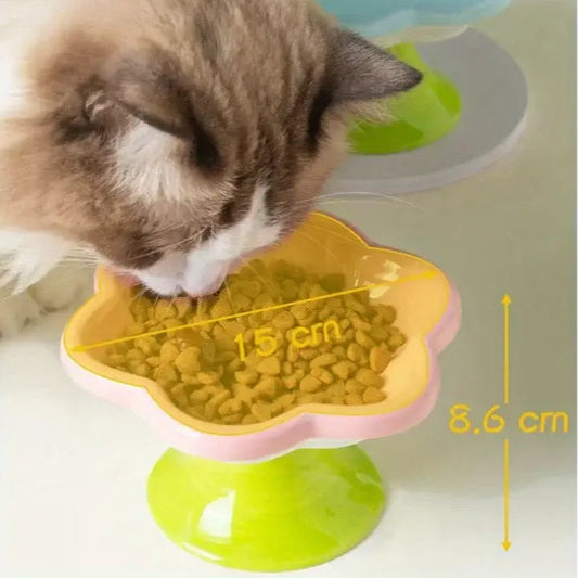 Elevated ceramic cat bowl with elegant flower design for comfortable and healthy feeding.