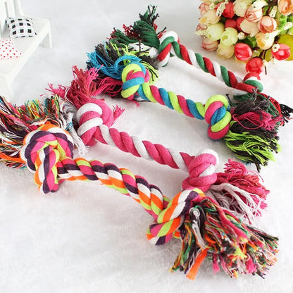 Durable cotton rope dog toy with knot design for small dogs and puppies, promotes dental health and safe chewing.