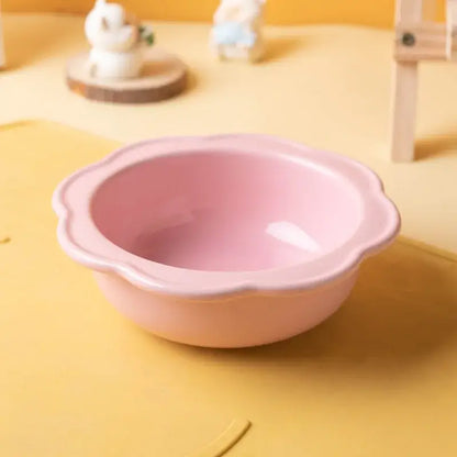 Flower-shaped ceramic pet bowl with clear acrylic stand for cats and dogs.