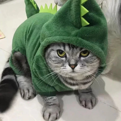 Small dog or cat wearing a Funny Dinosaur Cosplay Costume, showcasing a cozy fleece hoodie perfect for Halloween.