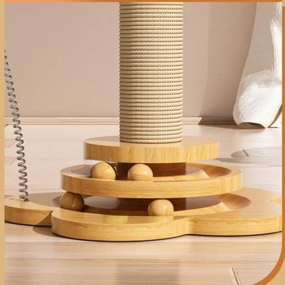Wooden interactive cat turntable toy with rotating ball track and built-in sisal scratching board.