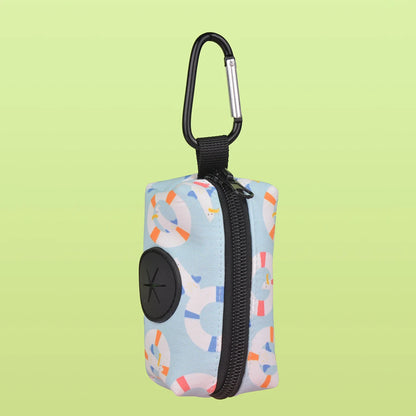Colorful dog poop bag dispenser with leash clip and stylish print design