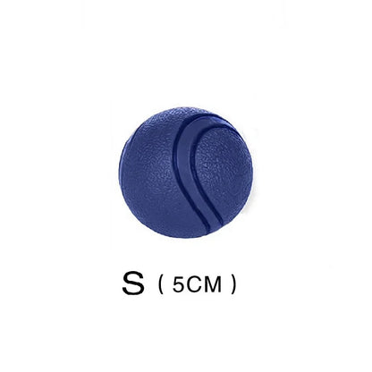 Durable red rubber dog ball made from TPR, designed for strong chewers and active dogs, available in multiple sizes.