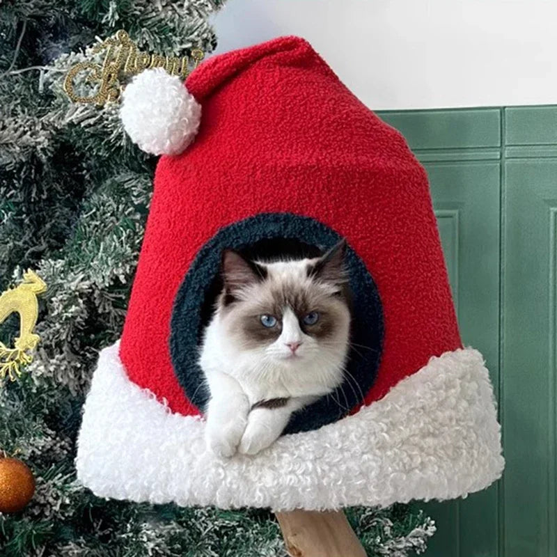 Festive Christmas tree cat tree with sisal rope posts, platforms, and a cozy cat house for climbing and scratching.