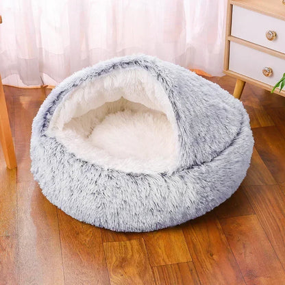 Plush winter round dog bed for small and medium pets, providing warmth and comfort for a cozy resting spot.
