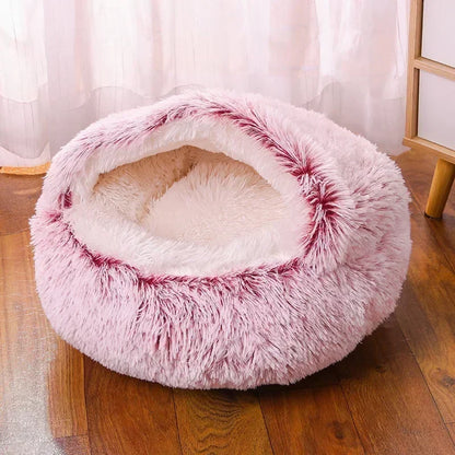 Plush winter round dog bed for small and medium pets, providing warmth and comfort for a cozy resting spot.