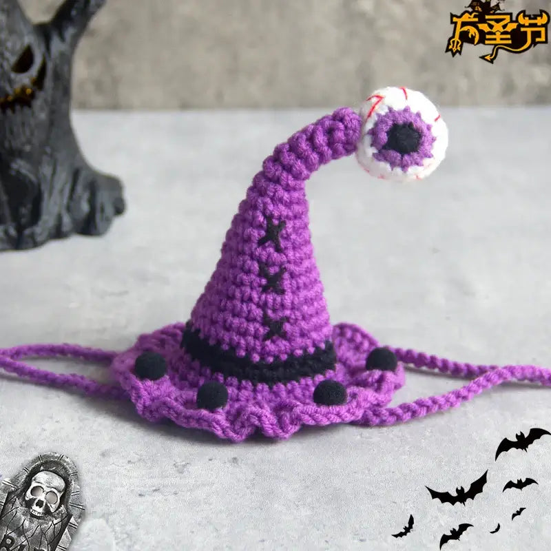 Hand-knit Halloween pet collar bib featuring ghost designs, perfect for dressing up cats and dogs during the spooky season.