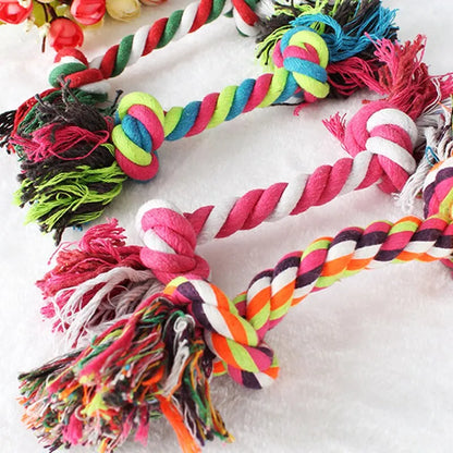 Durable cotton rope dog toy with knot design for small dogs and puppies, promotes dental health and safe chewing.
