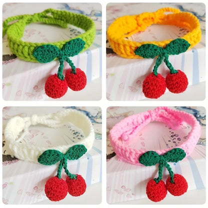 Handmade knitted pet collar with cherry decoration for cats