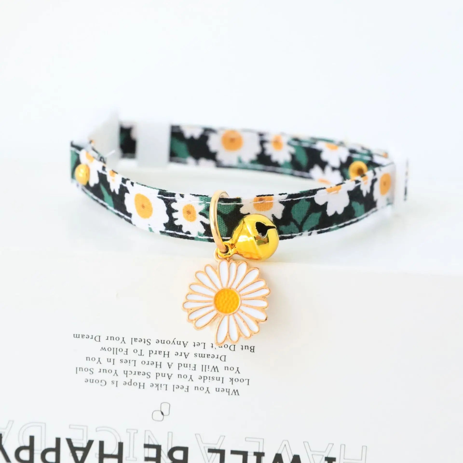 Plaid bow cat collar with daisy charm, safety buckle, and reflective design for small dogs and cats