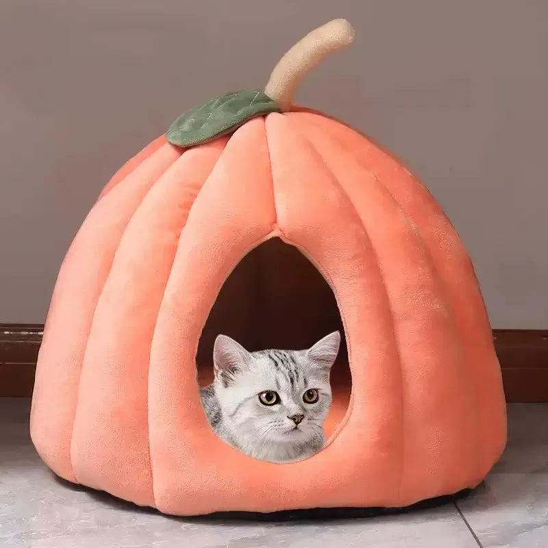 Pumpkin-shaped cat bed, Halloween pet bed for cats, fully enclosed pet nest, cozy winter cat nest, festive cat cushion.