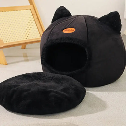 Deep sleep comfort cat bed in cave design, made with soft plush material and non-slip base for warm, cozy winter sleep.