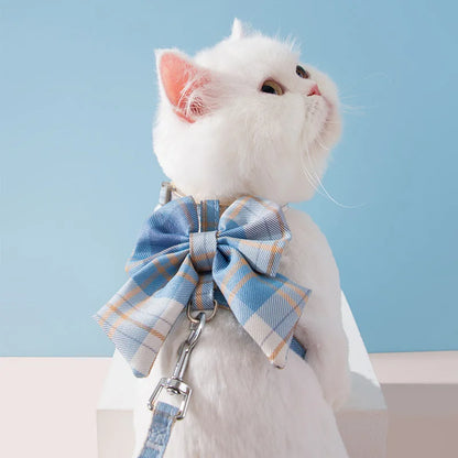 Adorable cat and dog harness vest with adjustable breast strap and matching leash for small pets.