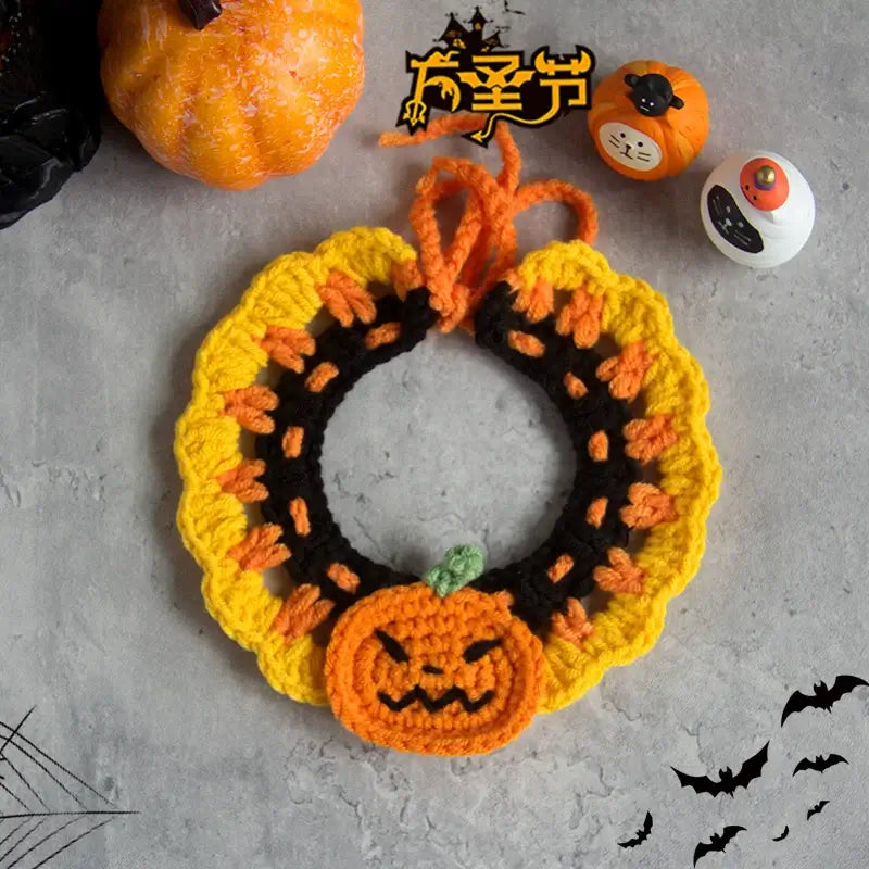 Hand-knit Halloween pet collar bib featuring ghost designs, perfect for dressing up cats and dogs during the spooky season.