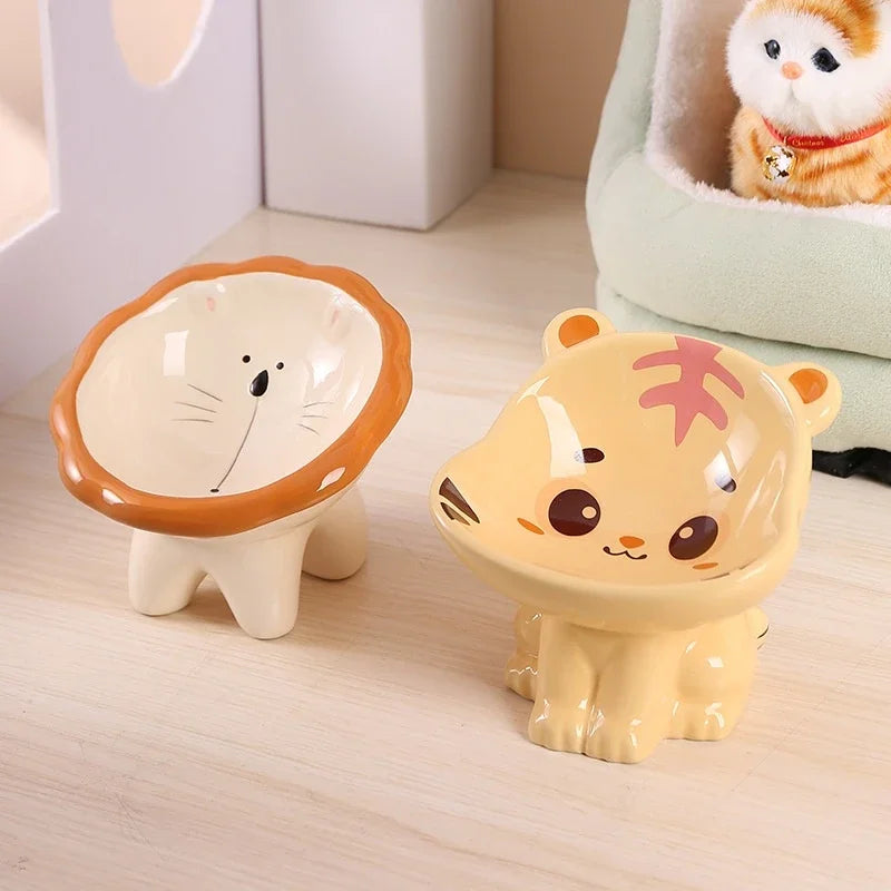 Cute ceramic cartoon pet bowl elevated for cats and small dogs.