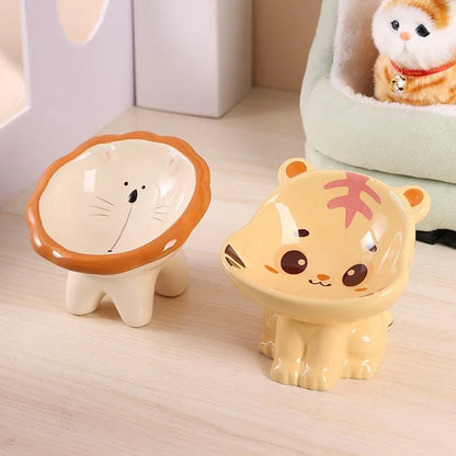 Cute ceramic cartoon pet bowl elevated for cats and small dogs.