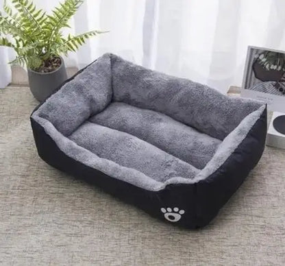 Bone-shaped soft cotton dog bed, washable and breathable with warm padding, designed for year-round comfort and suitable for dogs of all sizes.