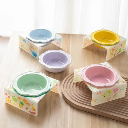 Flower-shaped ceramic pet bowl with clear acrylic stand for cats and dogs.