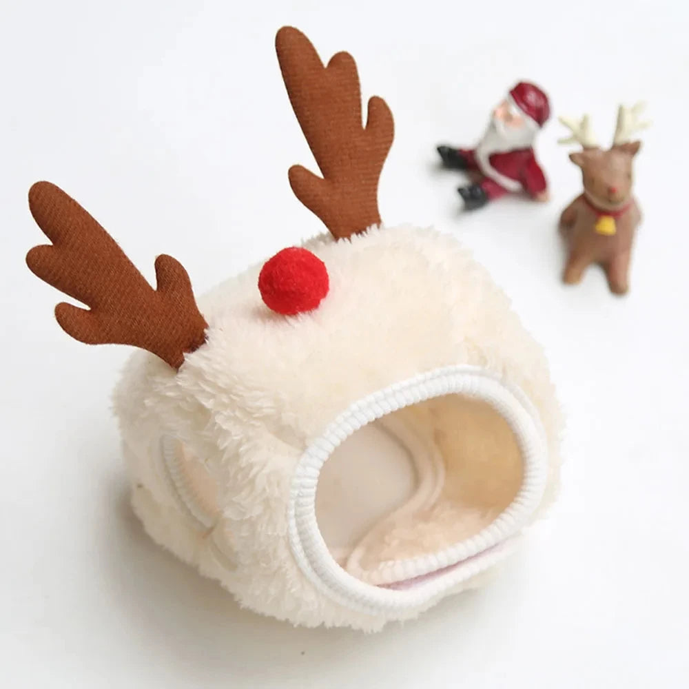 Pet wearing a Santa elk hat and Christmas bandana bib scarf for holiday celebration