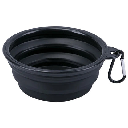 Collapsible silicone dog bowl for travel, camping, and hiking, lightweight and portable for outdoor pet feeding.