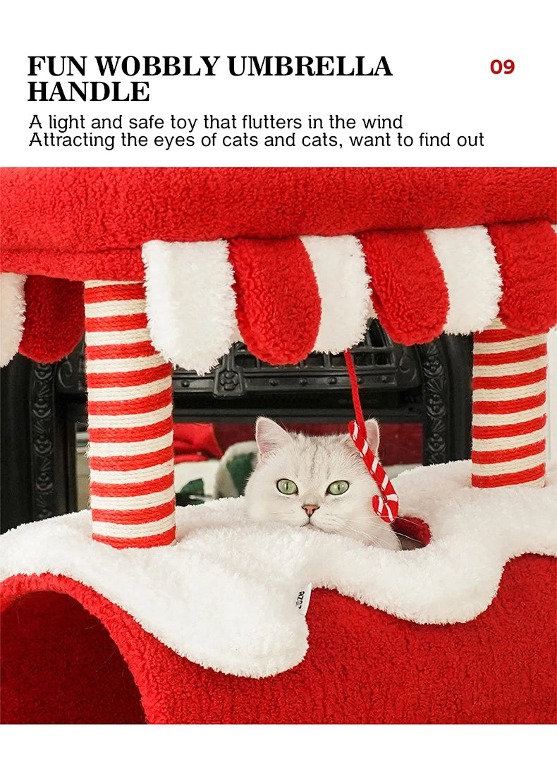 Christmas-themed cat climbing frame with cozy sleeping nest and sisal scratching posts.