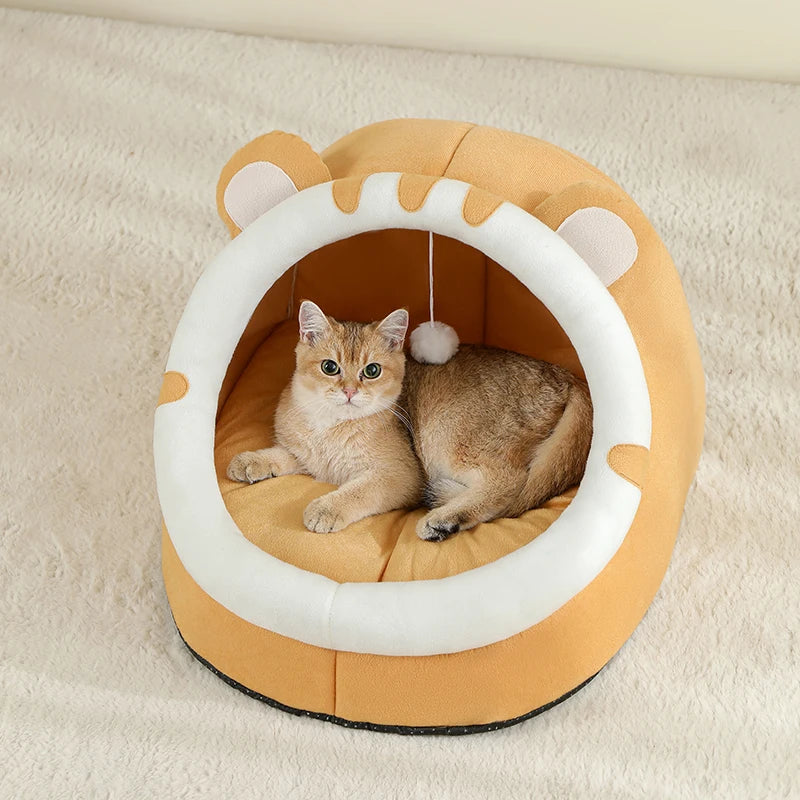 Super cat bed with cave design and plush cushion, providing warmth and comfort for cats during winter.