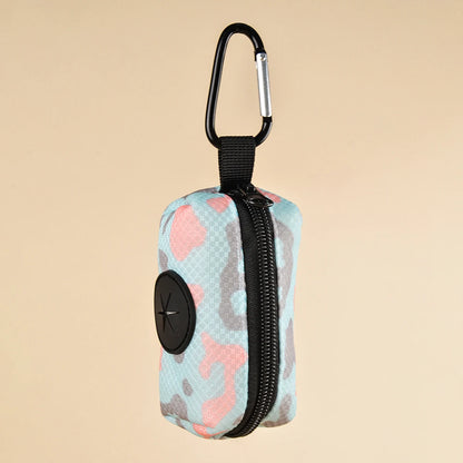 Colorful dog poop bag dispenser with leash clip and stylish print design