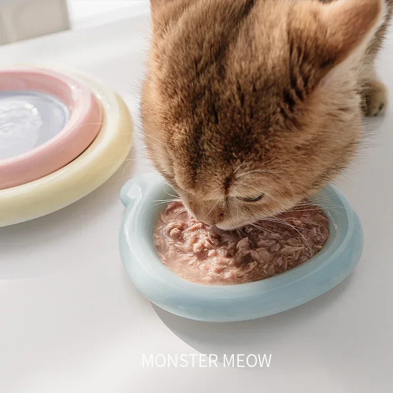 Cute cartoon ceramic pet bowl for cats and small dogs, perfect for food and water, with a charming design and easy-to-clean surface.