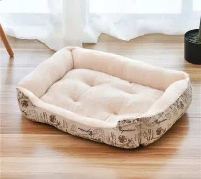 Bone-shaped soft cotton dog bed, washable and breathable with warm padding, designed for year-round comfort and suitable for dogs of all sizes.