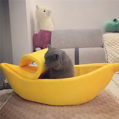 Large banana-shaped plush cat bed for small dogs and cats