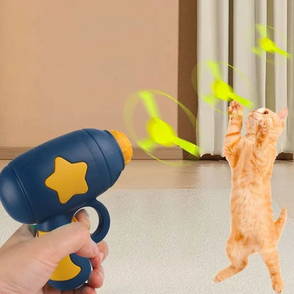 Cat jumping to catch a flying disc launched by interactive cat toy
