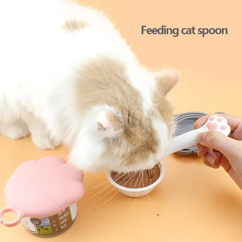 Multifunctional pet spoon and can opener for easy food storage and serving.