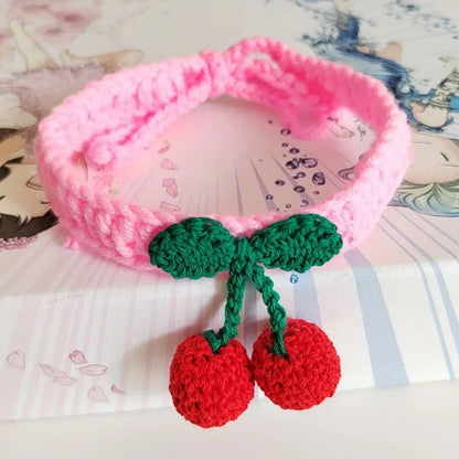 Handmade knitted pet collar with cherry decoration for cats