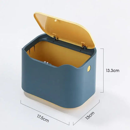 Compact enclosed cat waste box with sealed lid, odor-control design, and easy-carry handle for litter storage.