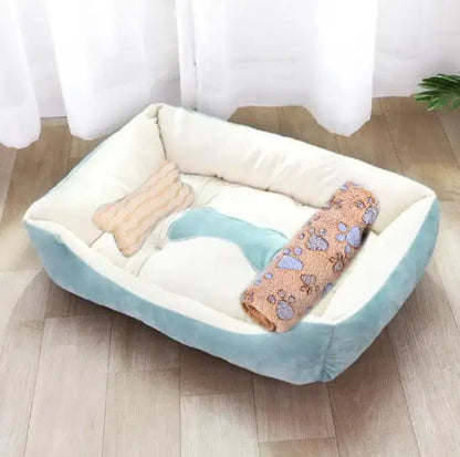 Bone-shaped soft cotton dog bed, washable and breathable with warm padding, designed for year-round comfort and suitable for dogs of all sizes.