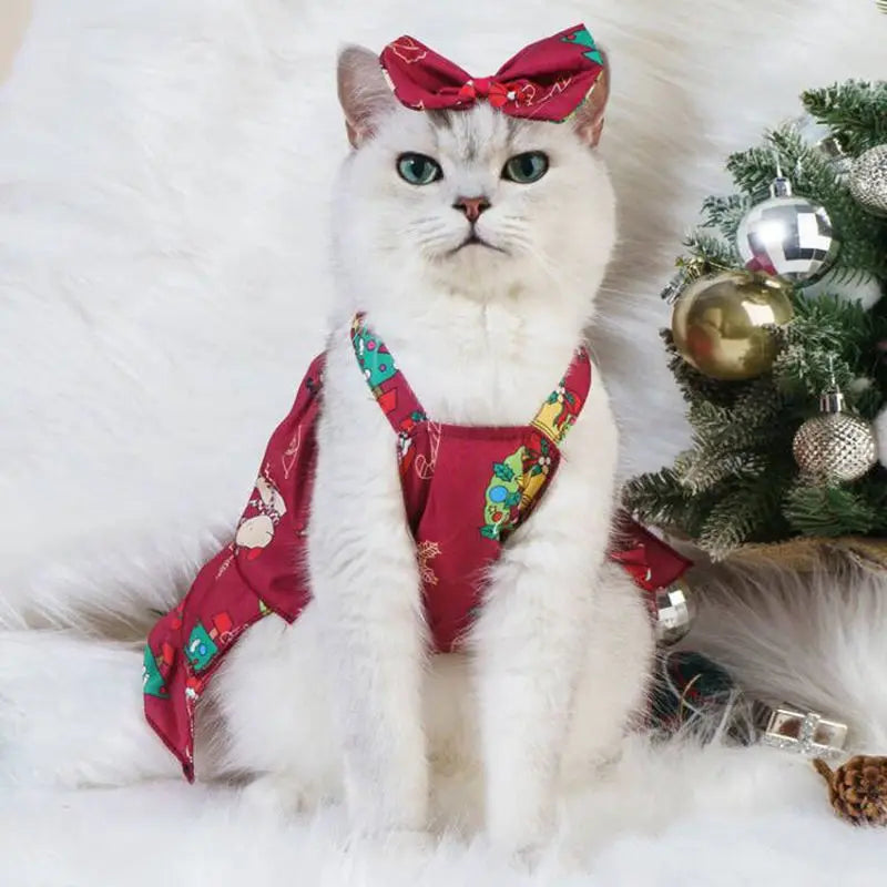 Cat wearing a flannel Christmas hoodie featuring Santa Claus and elk designs, perfect for holiday celebrations.