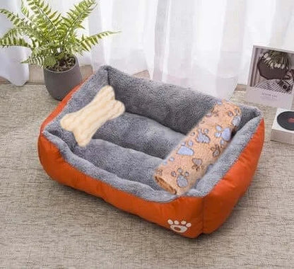 Bone-shaped soft cotton dog bed, washable and breathable with warm padding, designed for year-round comfort and suitable for dogs of all sizes.