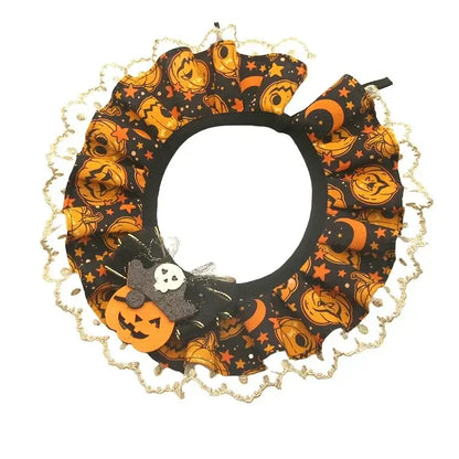 Soft cotton Halloween pet scarf with pumpkin pattern and adjustable collar for cats and dogs.