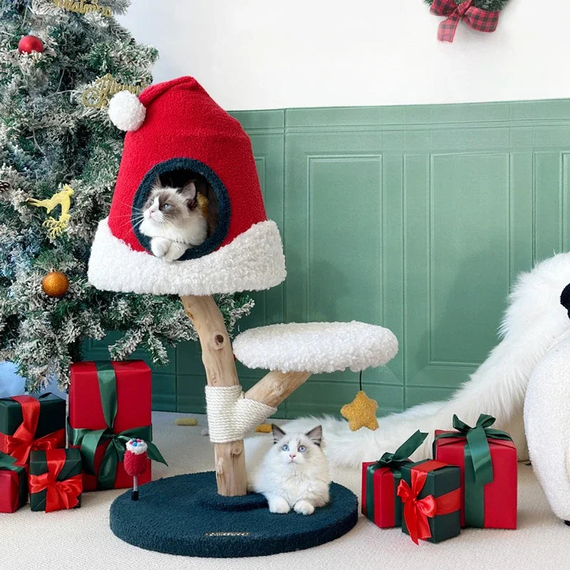 Festive Christmas tree cat tree with sisal rope posts, platforms, and a cozy cat house for climbing and scratching.