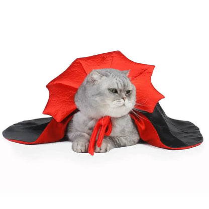 Black vampire cloak Halloween costume for cats with adjustable neckline and lightweight polyester fabric.